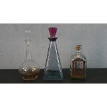 A Holmegaard Danish Advent decanter by Michael Bang along with an Italian Art Deco style decanter