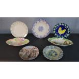 A collection of seven plates, including a Meissen blue onion pattern plate. Diam.29cm (largest)