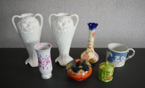 A collection of porcelain and ceramics, including two Art Nouveau design twin handled vases (