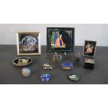 A collection of enamel boxes, butterfly wing plaques and Russian boxes. H.15 W.16.5cm (largest)