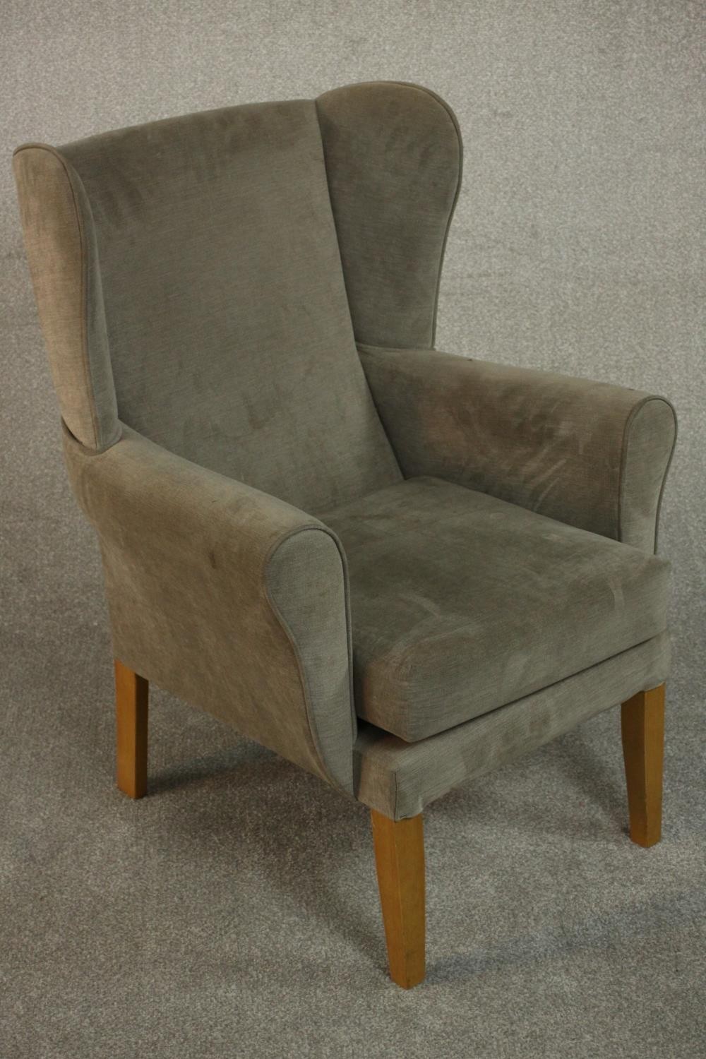 A contemporary wingback armchair in velour upholstery. - Image 3 of 6