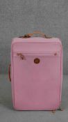 A pale pink leather wheel along Bric's suitcase with tan detailing. H.73 W.44 D.25cm.