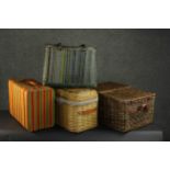 A collection of three woven baskets and a suitcase. H.25 W.53 D.36cm. (largest)