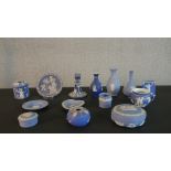 A collection of Wedgwood Jasperware items, including vases, boxes and covers, a candlestick and