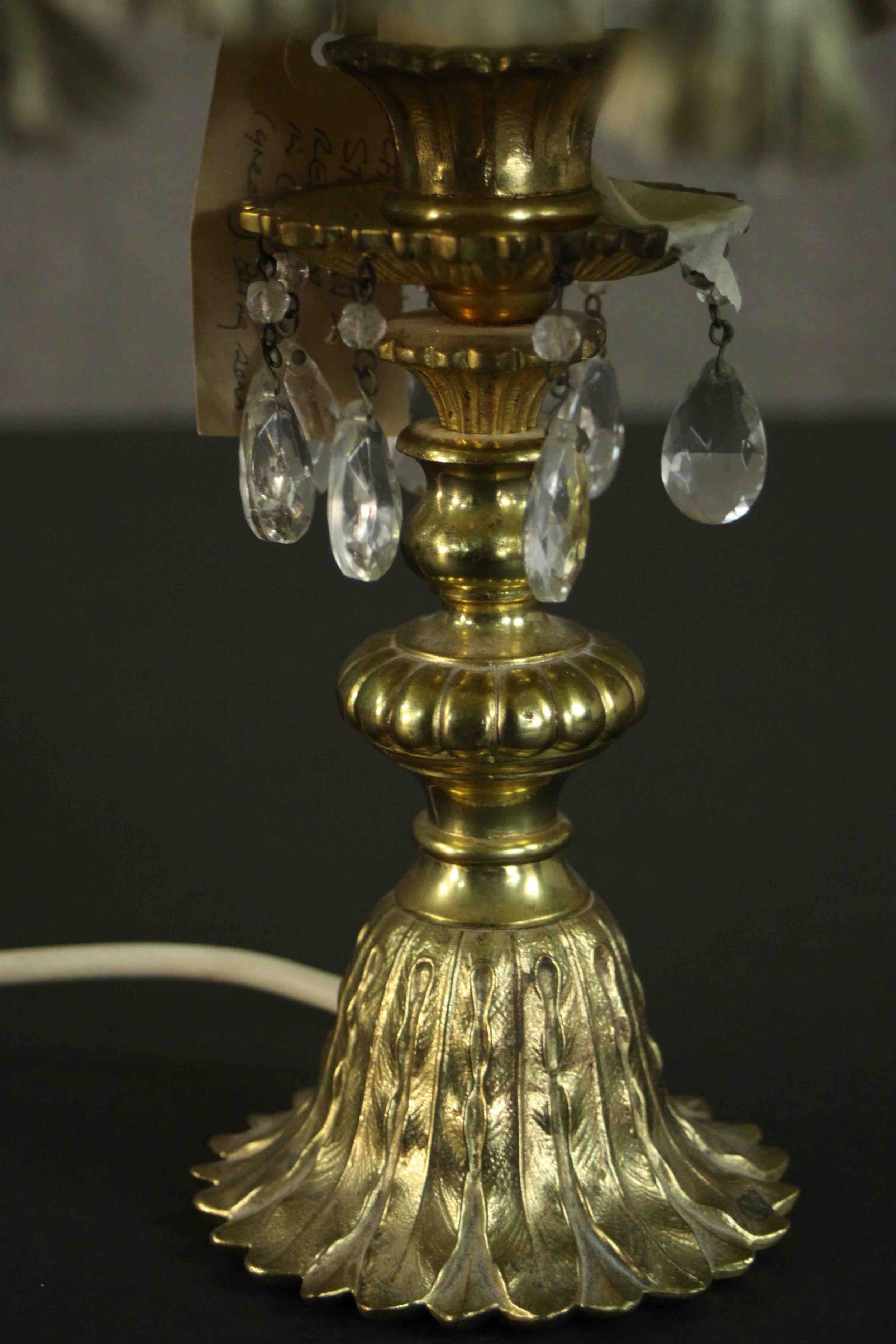 A brass table lamp, hung with faceted glass lustres on a cast feather base, with a pale green shade. - Image 5 of 5