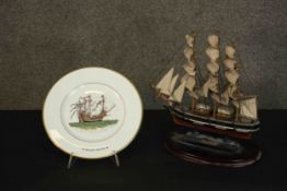 A Wedgwood limited edition Marie Rose plate and carved and painted model of the Cutty Sark with