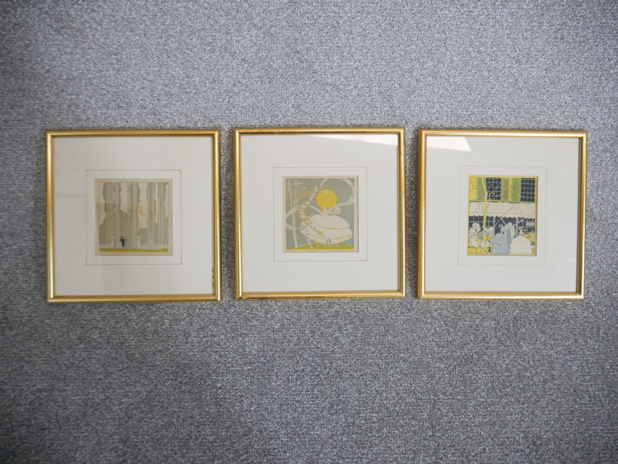 Three framed and glazed vintage woodblock prints, one of a couple in the woods, people outside a