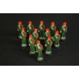 A set of twelve early 20th century painted clay and wire Indian soldiers. H.6.5cm.