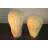 Two early 20th century canvas mannequin heads. H.28 Dia.16cm.