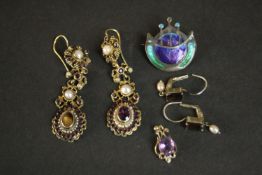 A collection of silver and silver gilt jewellery, including a James Fenton silver and enamel Art