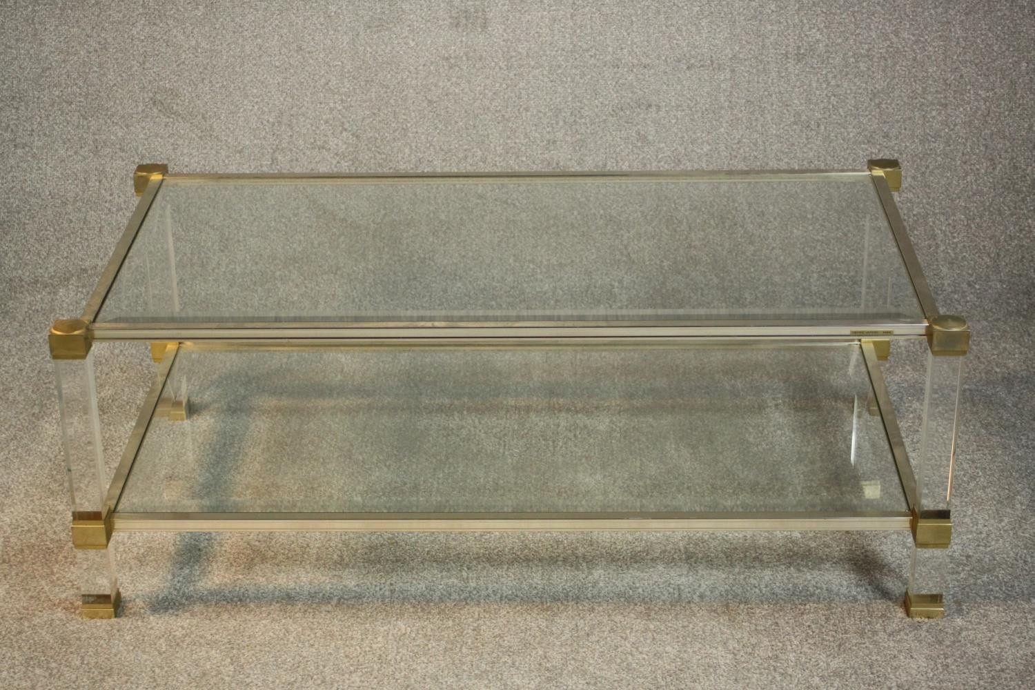 A Pierre Vandel of Paris coffee table in clear perspex, glass and pale brass finish, single under