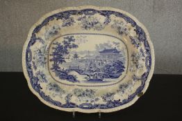 A circa 1830s Chinese Marine Opaque China serving platter, transfer printed in blue and white with