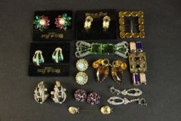 A collection of costume jewellery including, three pairs of Chris de Brett clip on earrings, two Art