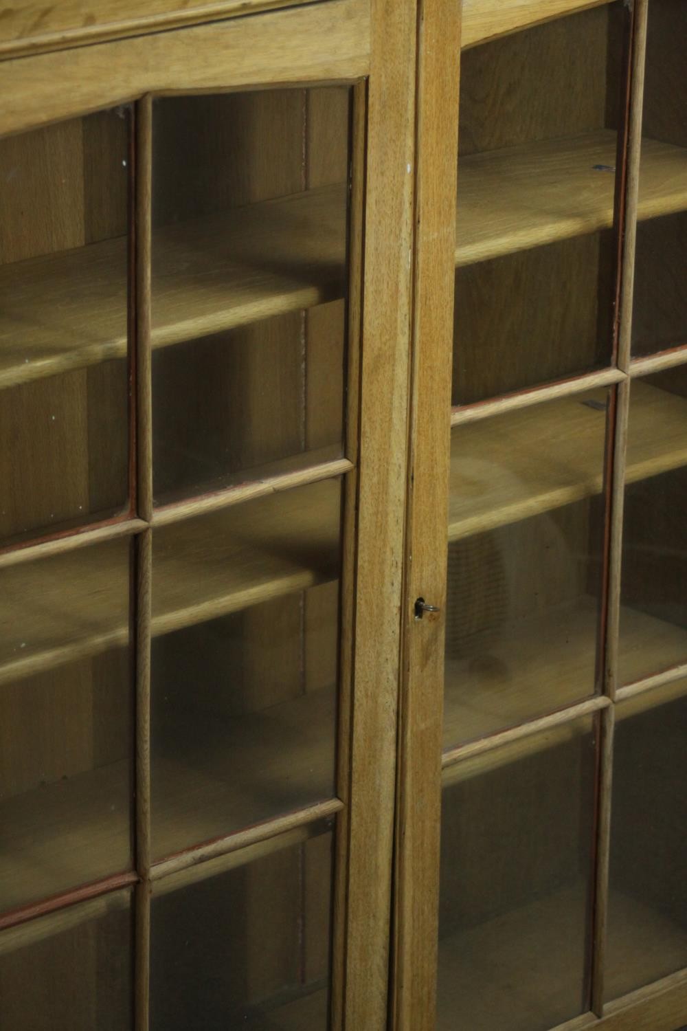 A 20th century oak bookcase section, with two glazed doors enclosing three shelves. H.102 W.92 D. - Image 5 of 6