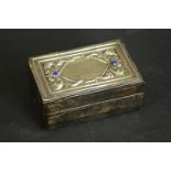 An Italian repousse silver and leather jewellery box with lapis lazuli cabochon detailing along with