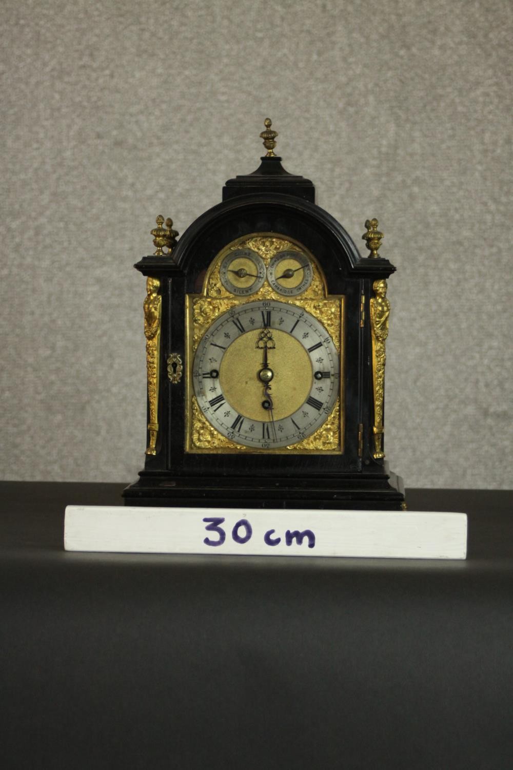 A late 19th Century George III style ebonised cased bracket clock, the arch dial incorporating a - Image 2 of 8