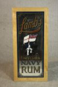 A Lamb's Finest Dark Navy Rum pub advertising mirror, in an ash frame. H.96 W.44cm.