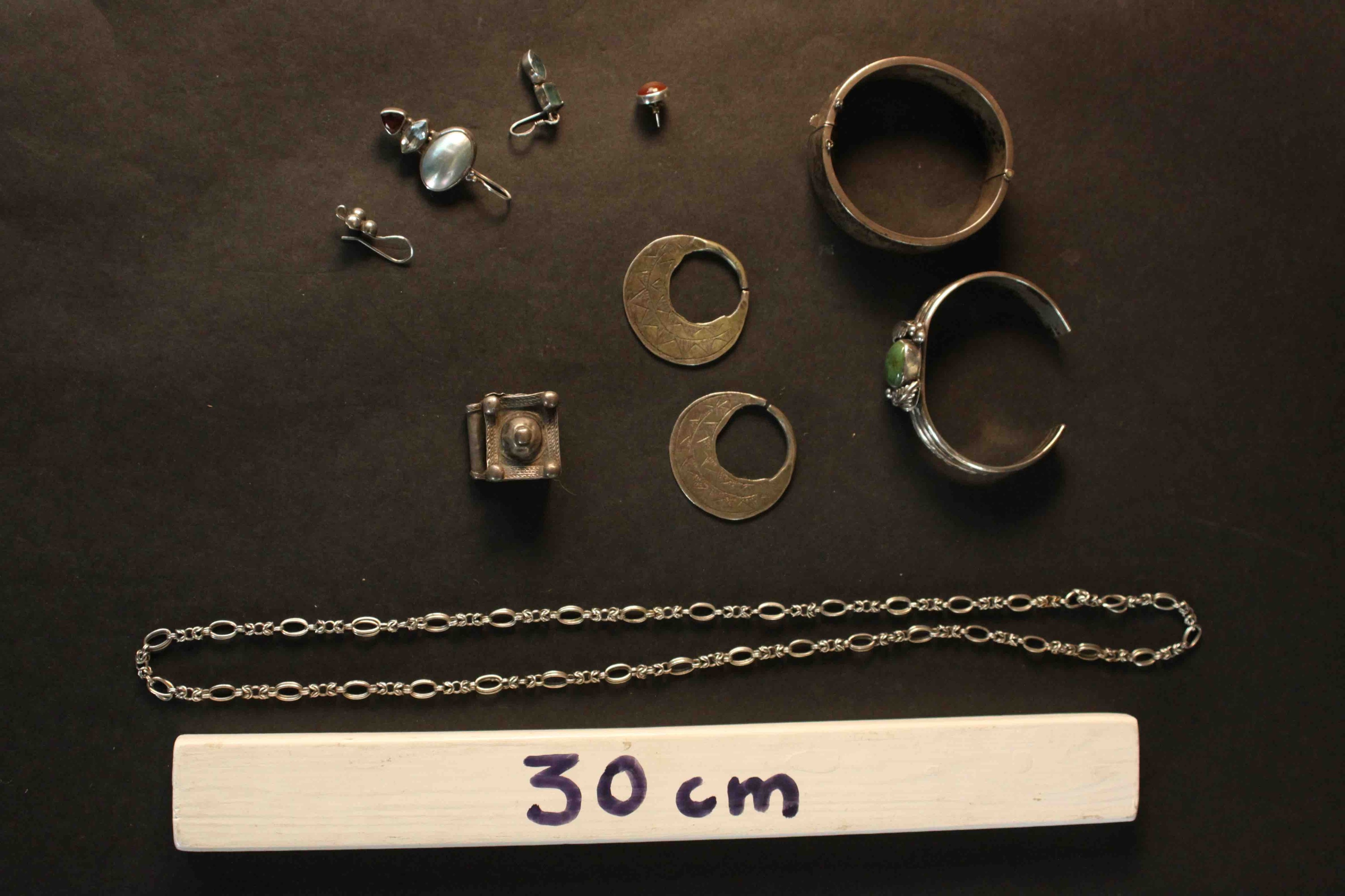 A collection of Oriental silver jewellery, including a engraved silver bangle with push catch and - Image 2 of 21