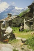 A framed photo of a mountain village with a man and chickens. H.70 W.60cm.