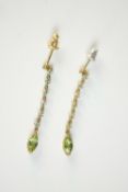 A pair of 9ct yellow gold peridot and blue topaz articulated earrings, each earring set with seven