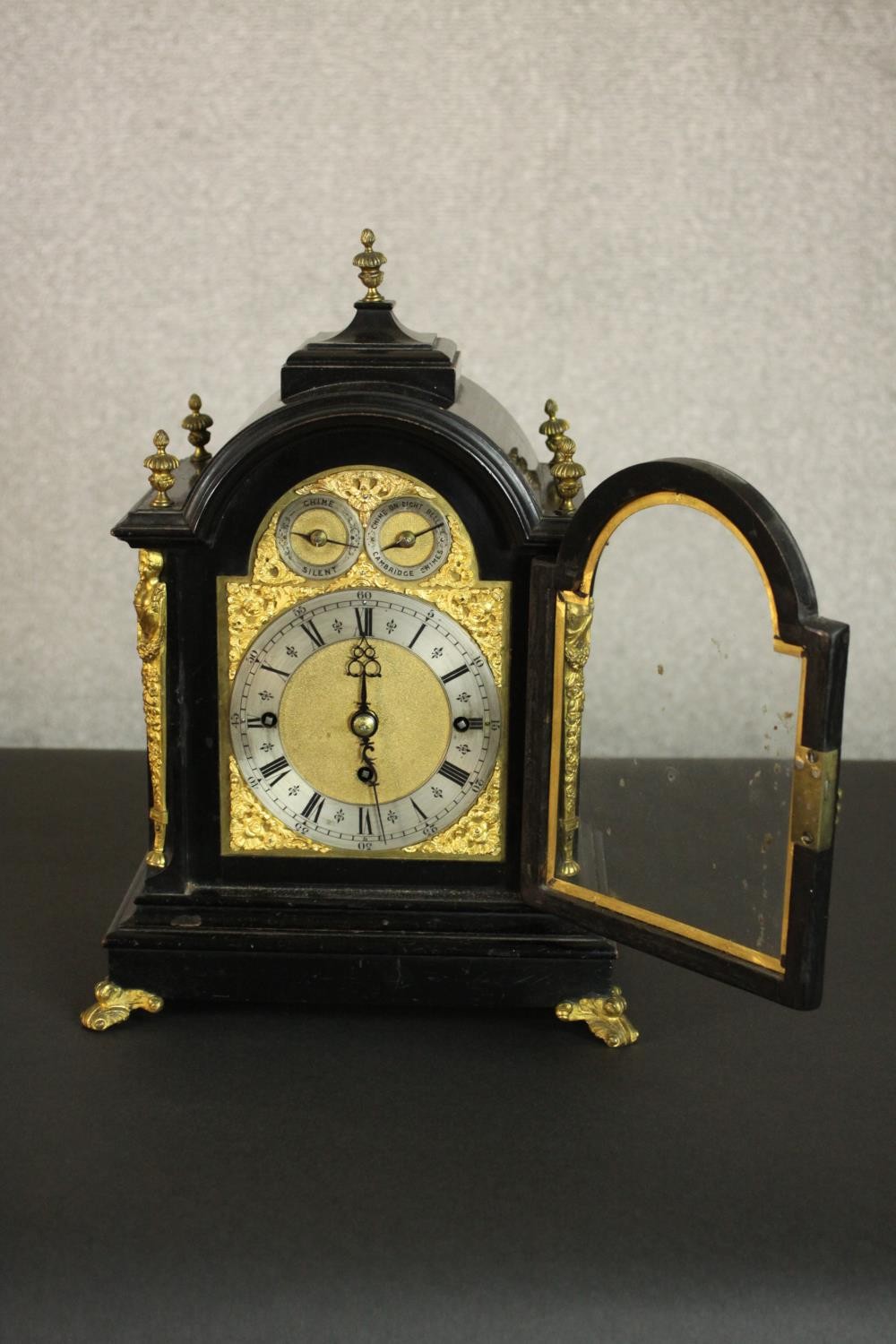 A late 19th Century George III style ebonised cased bracket clock, the arch dial incorporating a - Image 6 of 8