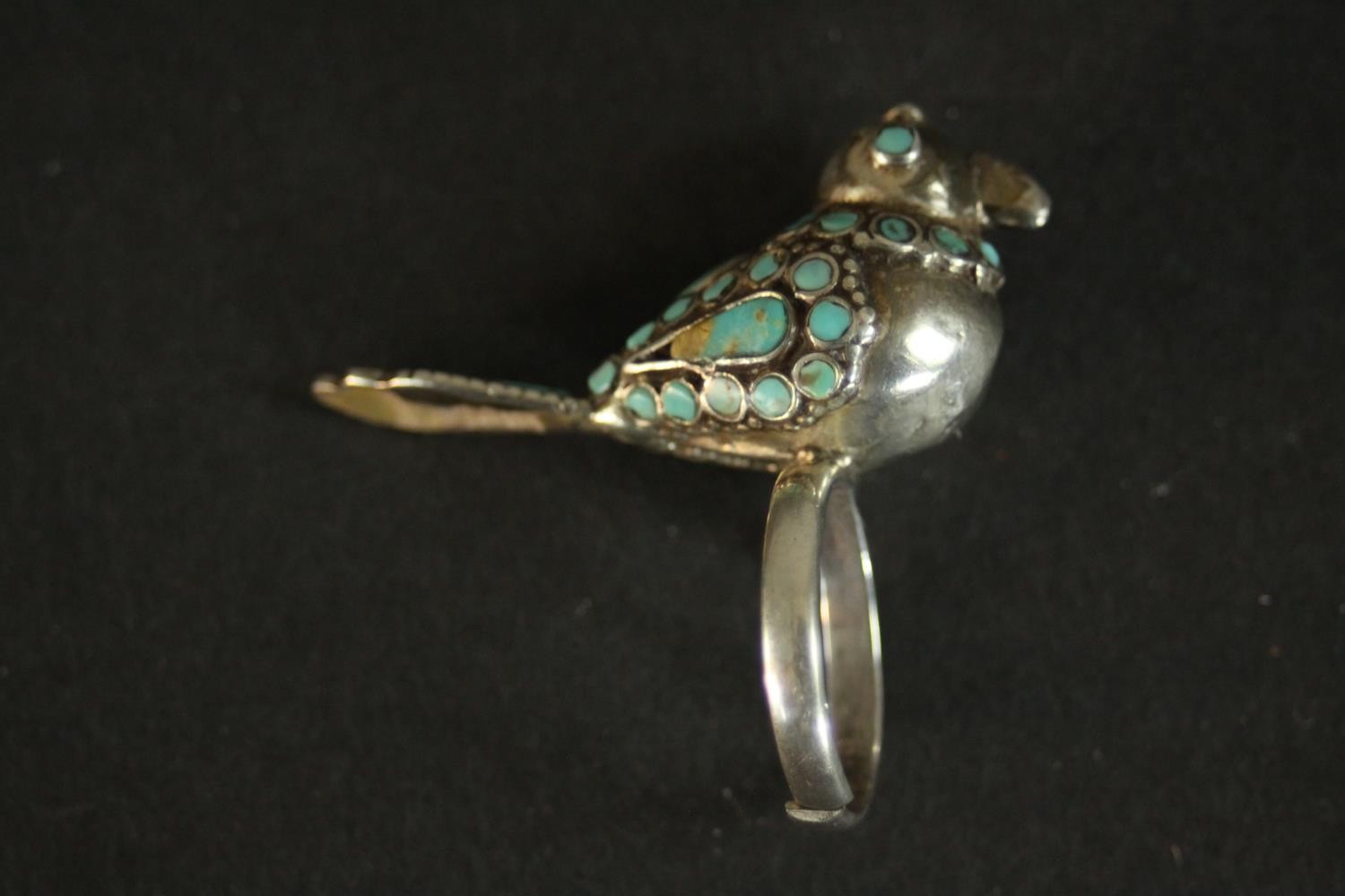 A Kuchi Afghan tribal headdress, an Afghan ring in the form of a bird with inlaid turquoise feathers - Image 7 of 9