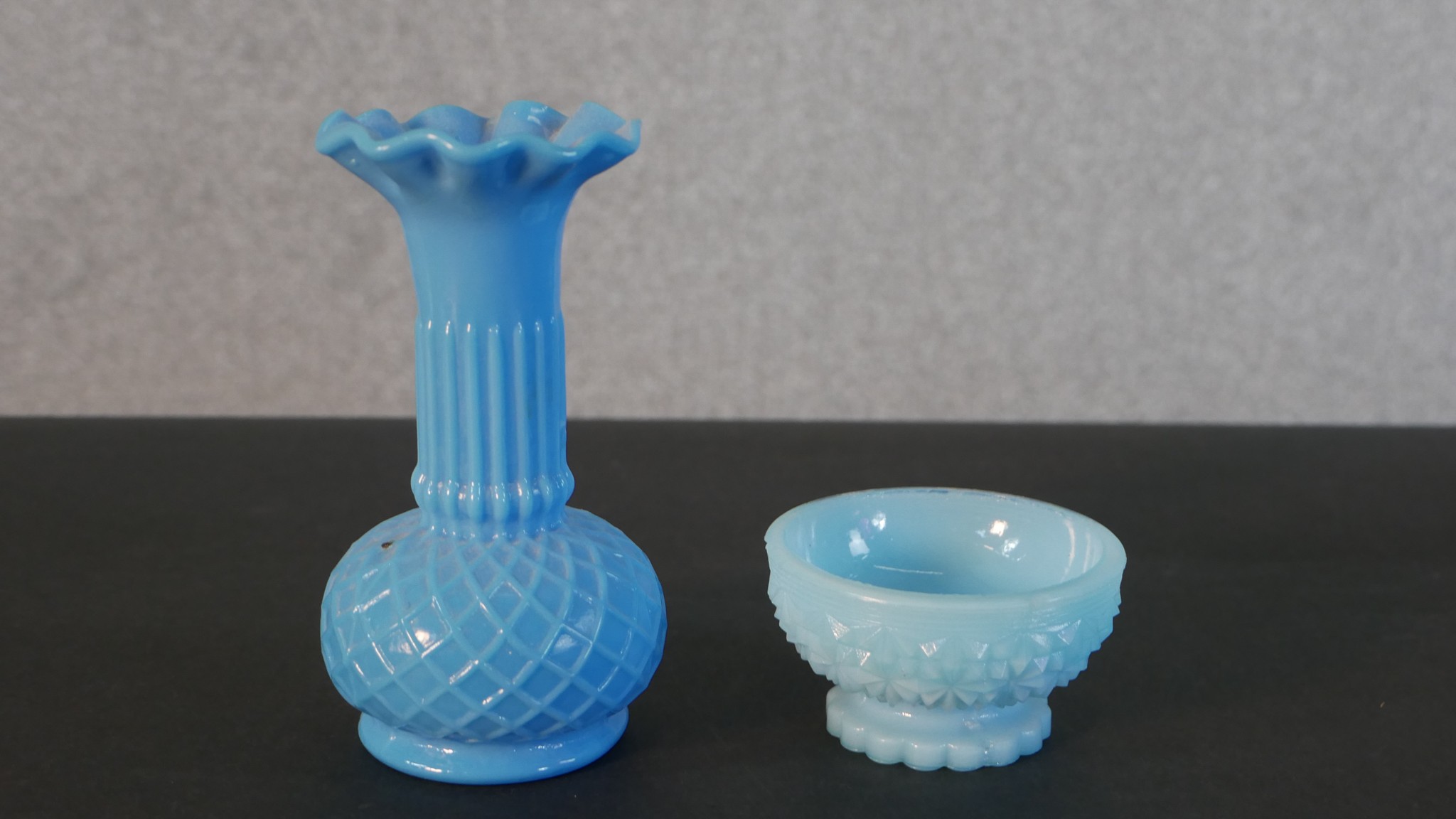 A large Chribska Czech studio cranberry glass vase along with two pressed opaline blue glass pieces. - Image 4 of 6