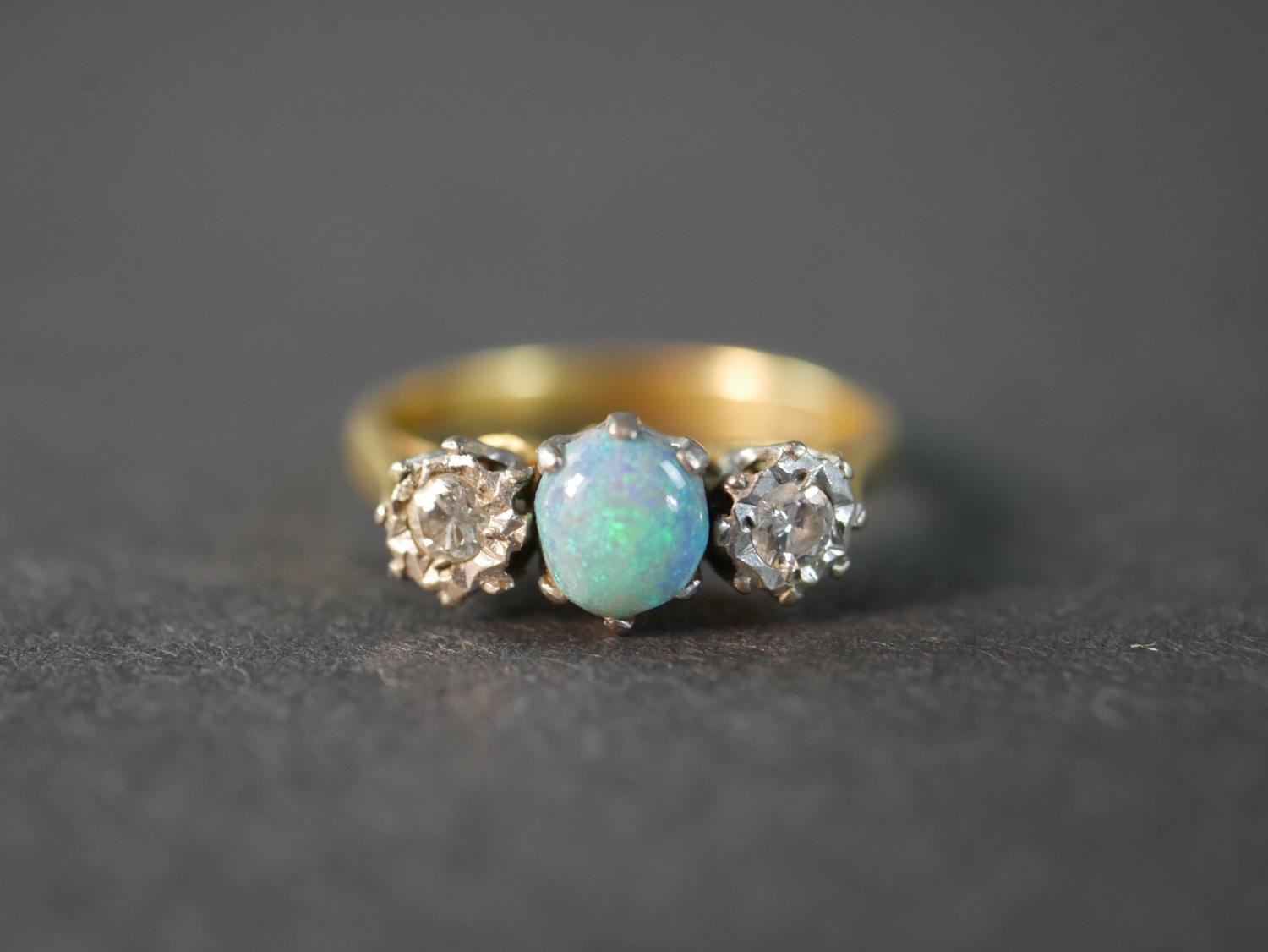 An 18 carat yellow gold and platinum Edwardian opal and diamond three stone ring, set to centre with - Image 2 of 5