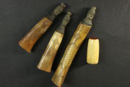 Three early 20th century engraved bone and hard wood shaman's medicine containers from East Timor