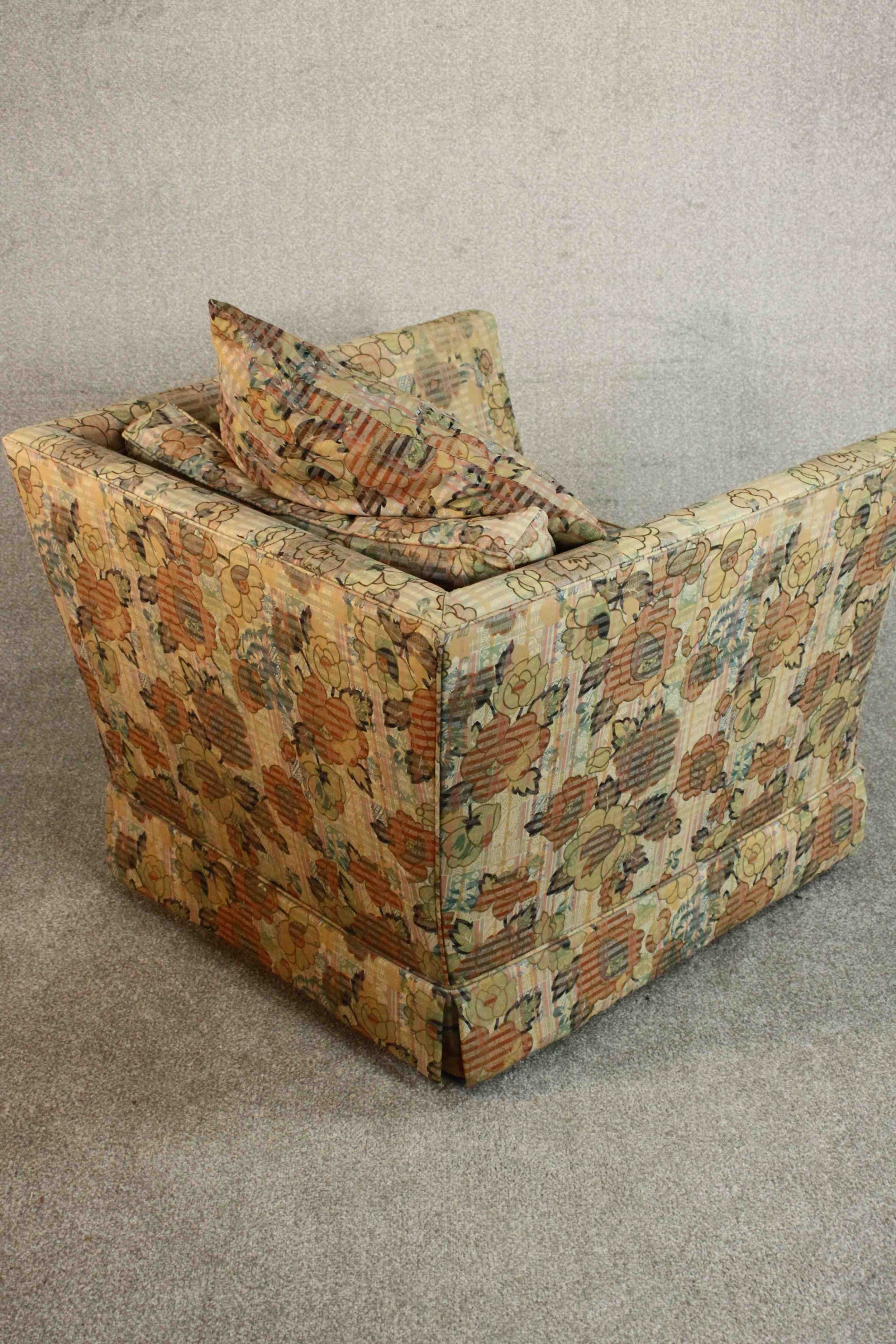 A late 20th century Knole style armchair, upholstered in polychrome foliate fabric. H.70 W.90 D. - Image 7 of 9