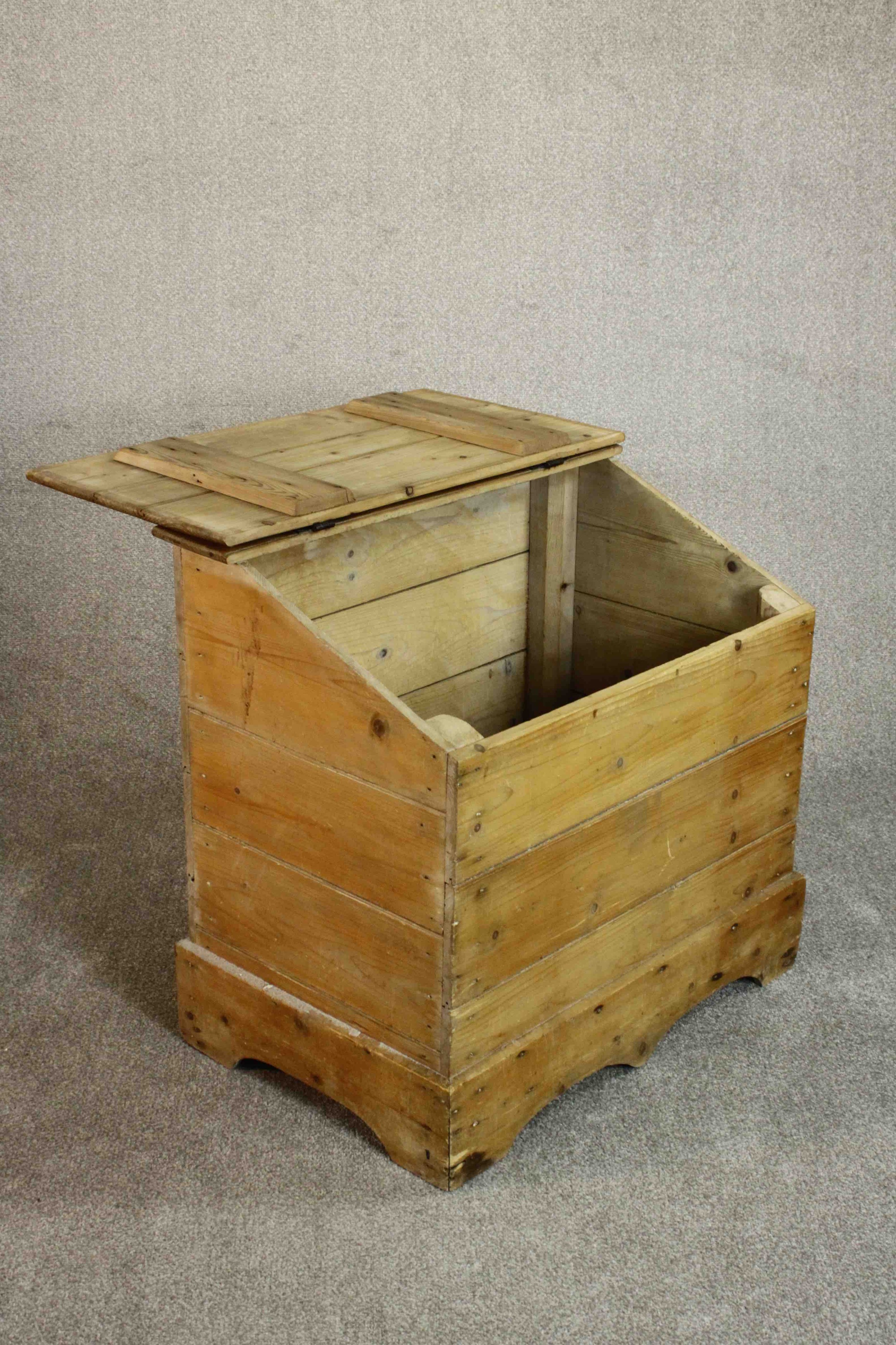 A Continental pine trunk, of plank form with a sloped lid and iron hinges on a shaped plinth base. - Image 4 of 7