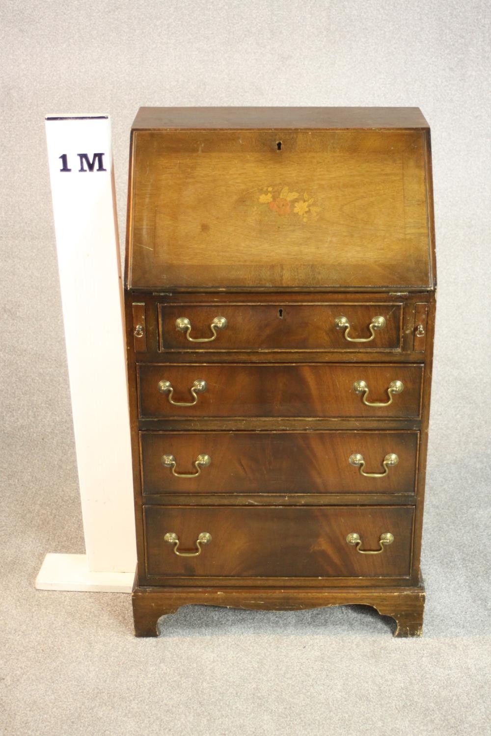 A George III style mahogany bureau, the fall front enclosing a drawer and pigeonholes, over four - Image 2 of 7