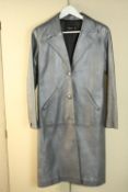 An Agnes B Speciale designer silver leather long coat, label to interior. Under arm to under