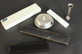 A collection of silver, including a leather cased engraved cheese scoop (Atkin Brothers, 1897), a