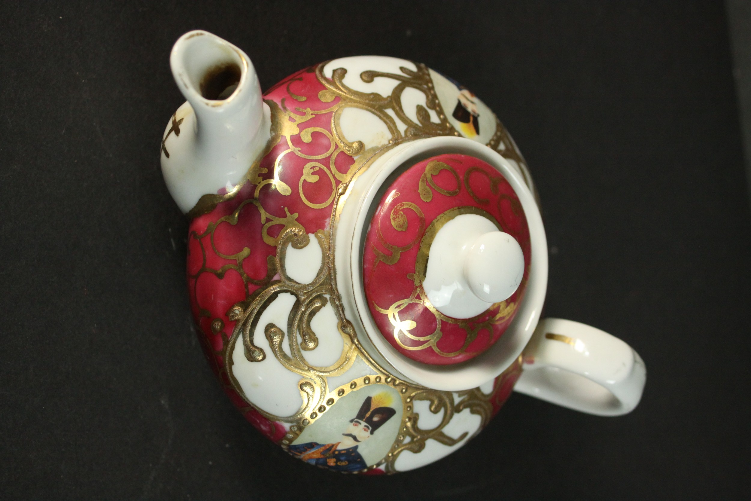 Three porcelain and pottery teapots, two made for the Persian market with portraits of Naser al- - Image 3 of 9