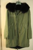 A designer Mr & Mrs Italy fox fur hood and rabbit fur lined green Parka coat, label to interior.