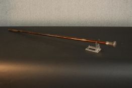 An early 20th century hardwood walking cane with silver woven effect handle. L.92cm.