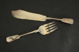 A Victorian engraved silver fish knife and fork serving set by Charles Boynton decorated with a