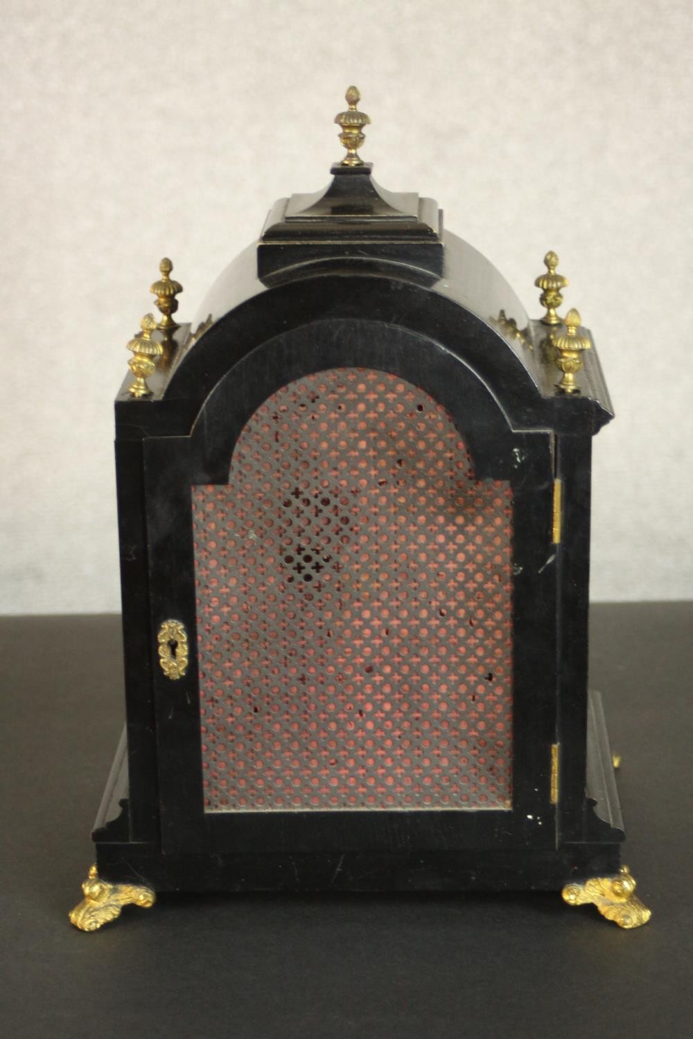 A late 19th Century George III style ebonised cased bracket clock, the arch dial incorporating a - Image 7 of 8
