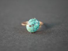 A Victorian turquoise and 9 carat rose gold dress ring, set with an oval cabochon turquoise with