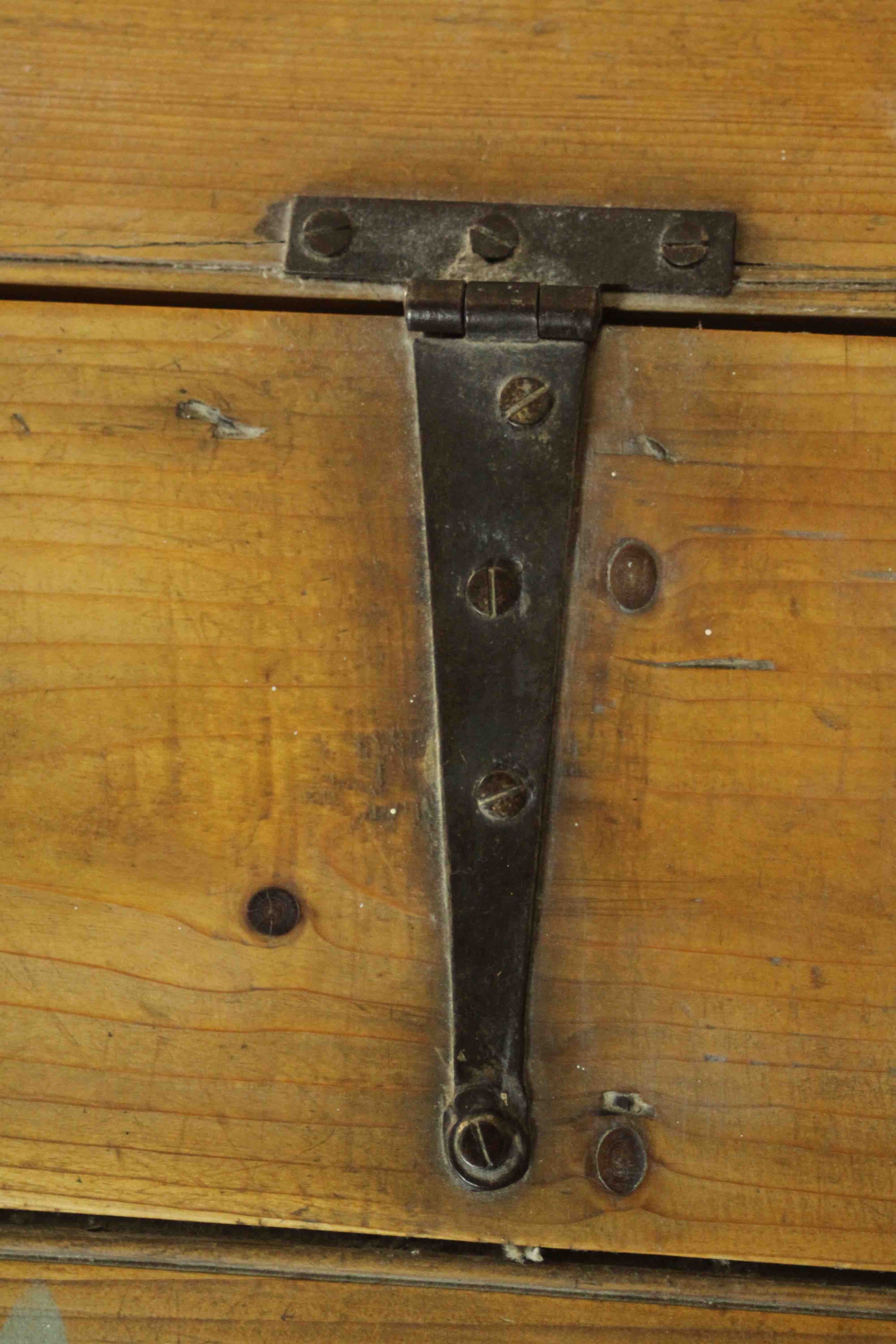 A Continental pine trunk, of plank form with a sloped lid and iron hinges on a shaped plinth base. - Image 6 of 7