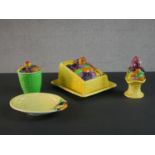 A collection of vintage hand painted Carlton ware, including a fruit basket design butter dish,