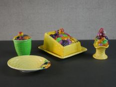 A collection of vintage hand painted Carlton ware, including a fruit basket design butter dish,