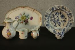 A collection of hand painted 19th century Meissen porcelain, including a Blue Onion pattern plate