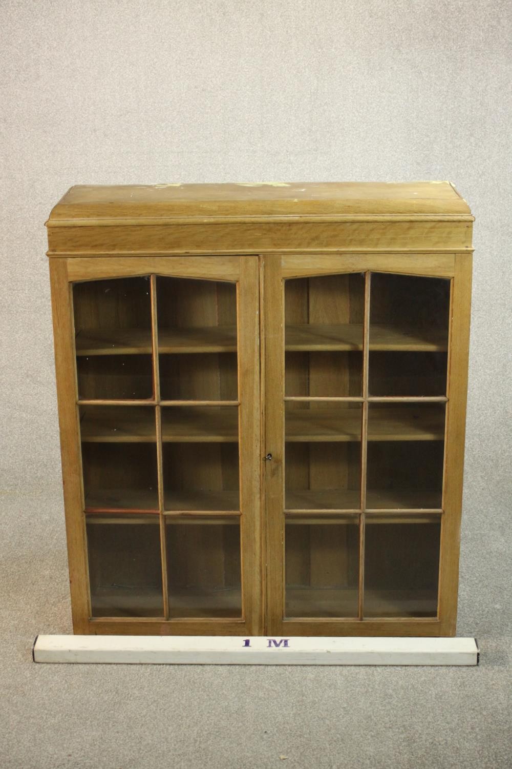 A 20th century oak bookcase section, with two glazed doors enclosing three shelves. H.102 W.92 D. - Image 2 of 6
