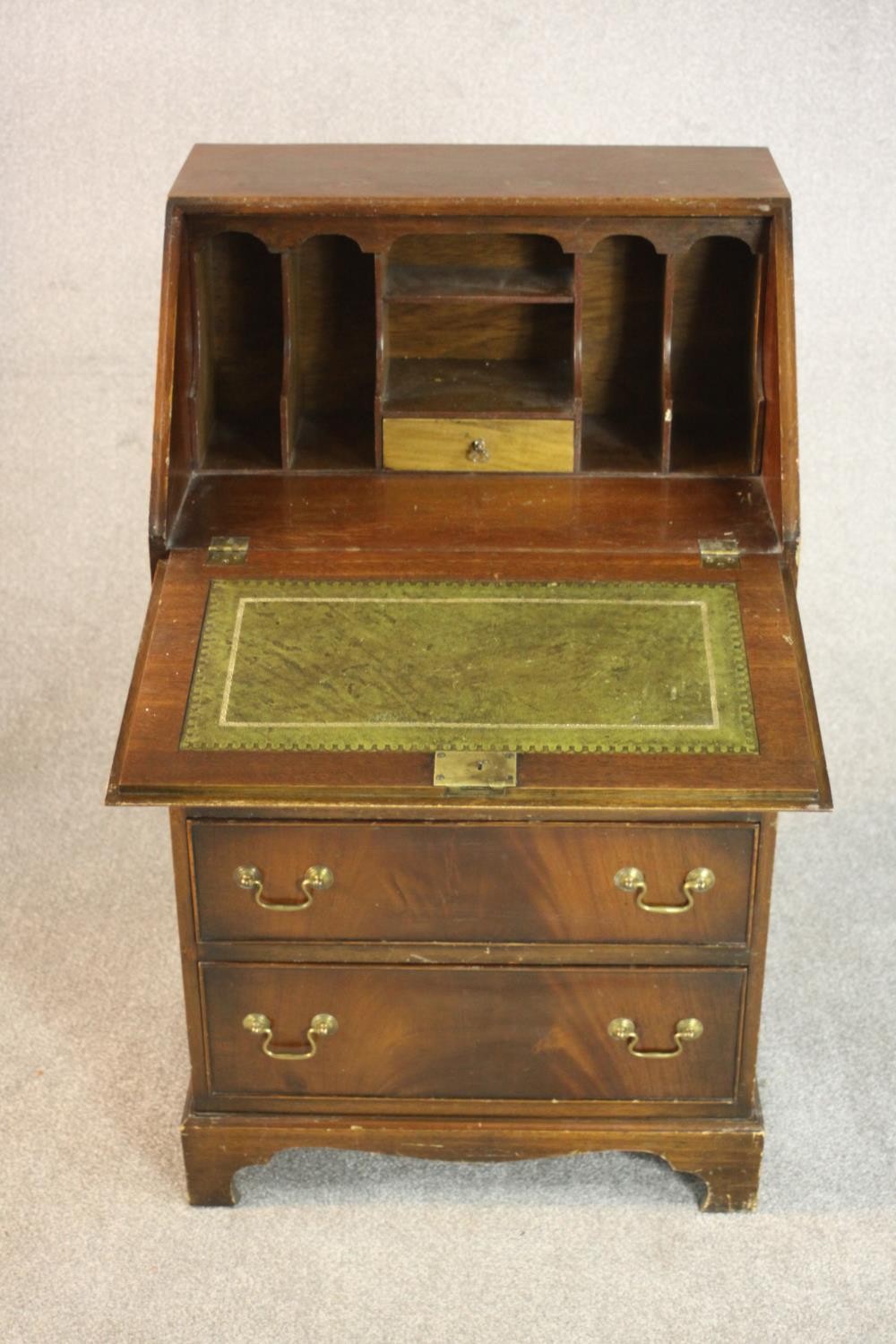 A George III style mahogany bureau, the fall front enclosing a drawer and pigeonholes, over four - Image 3 of 7