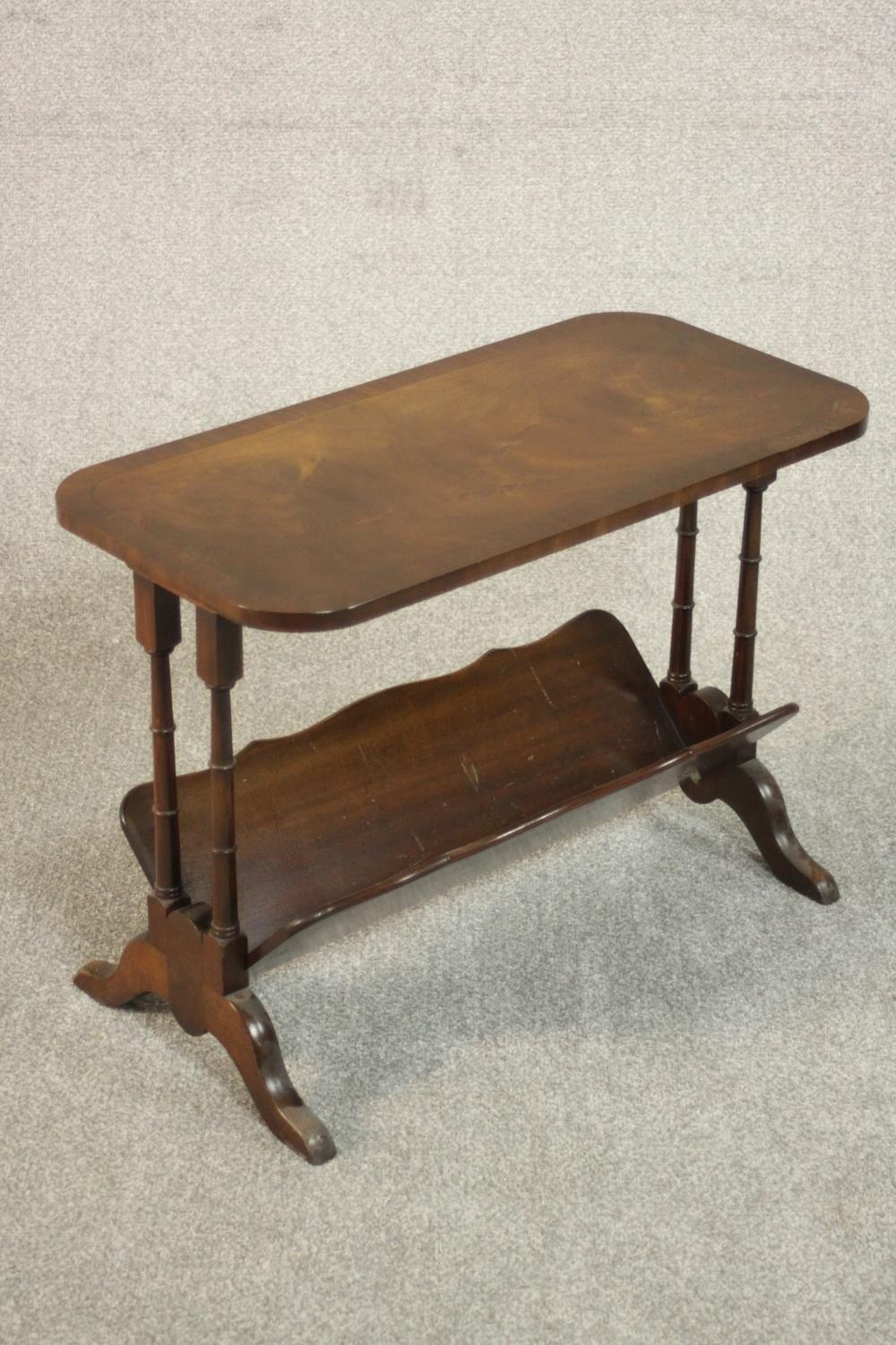 A Georgian style flame mahogany coffee table with magazine rack undertier. H.47 W.67 D.33cm. - Image 3 of 4