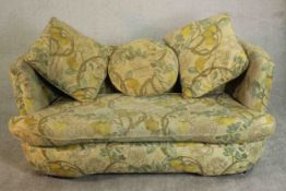 A Plumbs Furniture sofa, the upholstery decorated with fruit and flowers on a beige ground, with