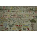 A late Victorian schoolroom sampler worked in cross-stitch with coloured thread on a large holed