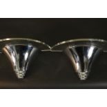 A pair of Art Deco chrome and acrylic trumpet design wall uplighters. H.17 W.39 D.20cm. (each)